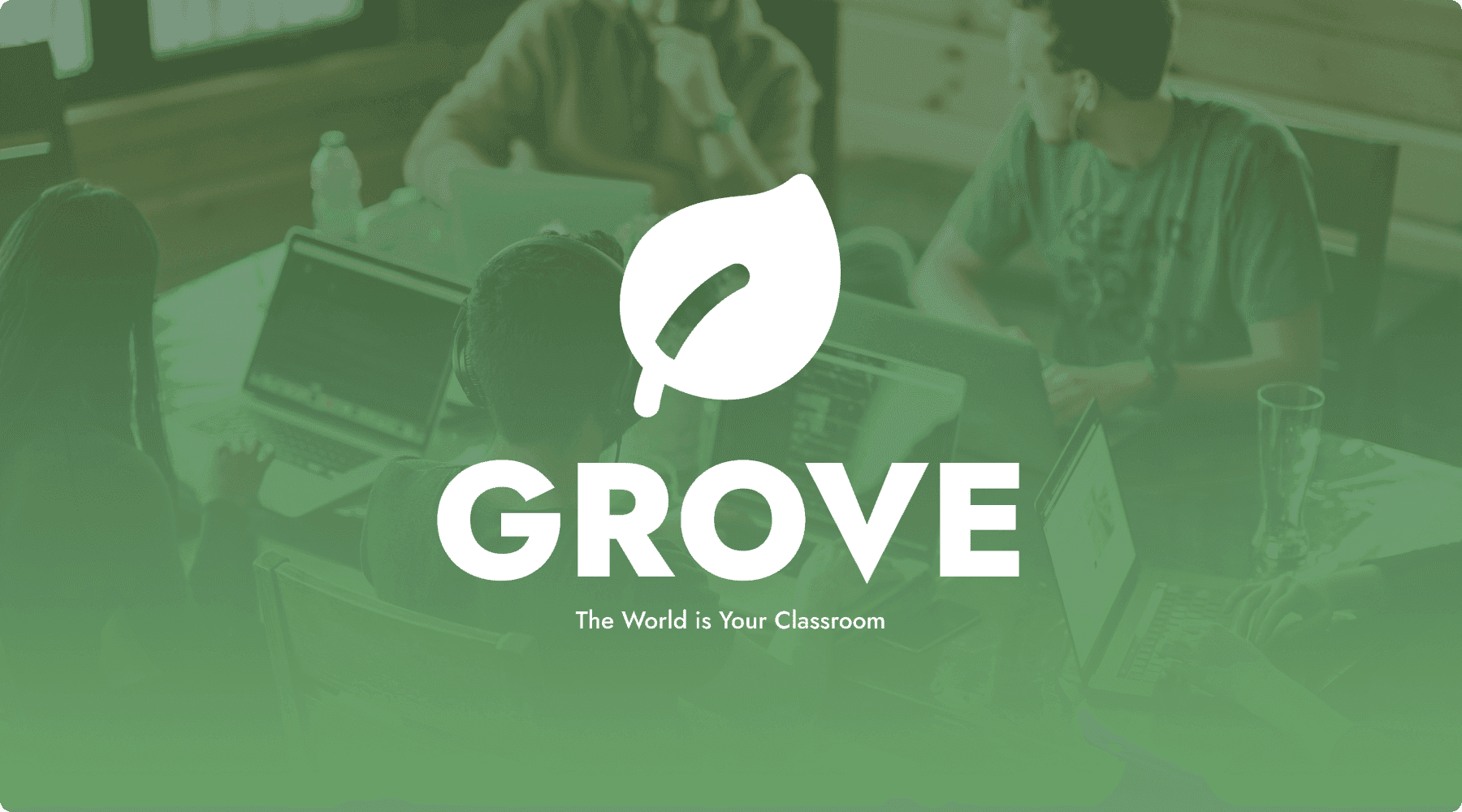 The Grove leaf logo and “Grove” wordmark with the tagline “The World is Your Classroom”, over a green-tinted photo of people working at laptops around a table.